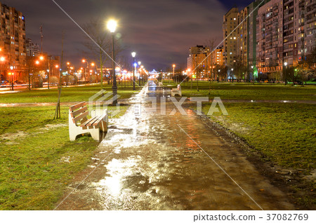 Alley at winter night. 37082769