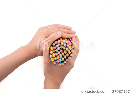 Hand holding Color Pencils 37087107