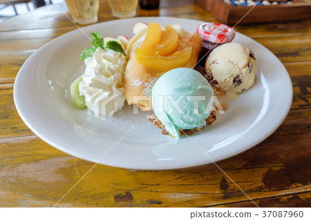 crepe with fresh fruit on wooden table crepe with fresh fruit on wooden table 37087960