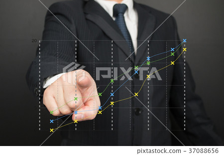 Businessman's pointing graph Businessman's pointing graph 37088656