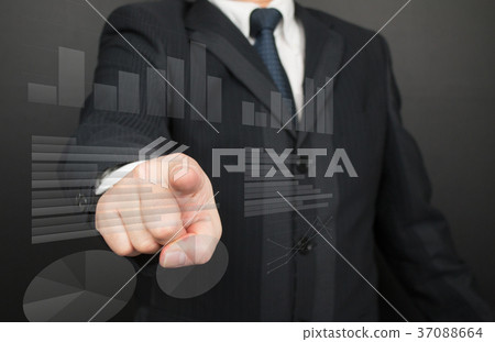 Businessman's pointing graph Businessman's pointing graph 37088664