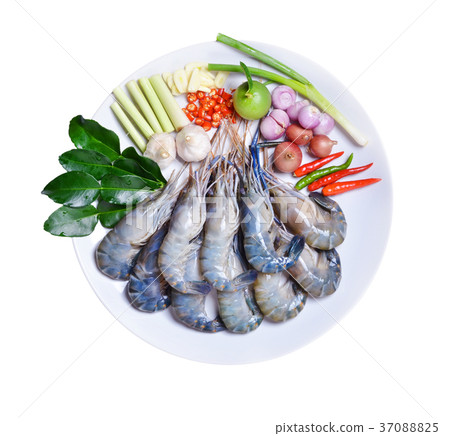 Tom Yum Kung and condiments (Thai cuisine). Tom Yum Kung and condiments (Thai cuisine). 37088825