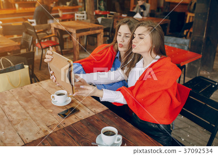 two girls in a cafe 37092534