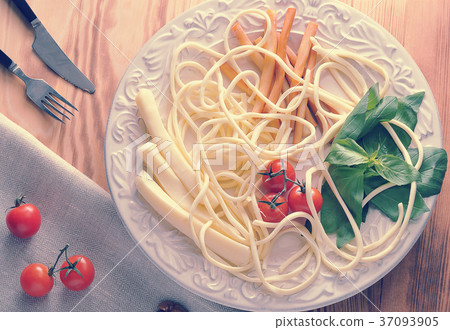 various types of cheese in a bowl with Basil various types of cheese in a bowl with Basil 37093905