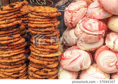 Showcase with meringues in store. Showcase with meringues in store. 37094167