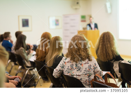 Audience in lecture hall on scientific conference. 37095105