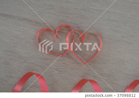 Heart shaped red ribbon 37098812