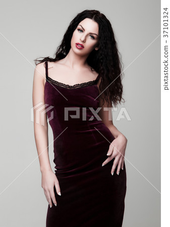 Sexy beautiful fashion model wearing velvet dress Sexy beautiful fashion model wearing velvet dress 37101324