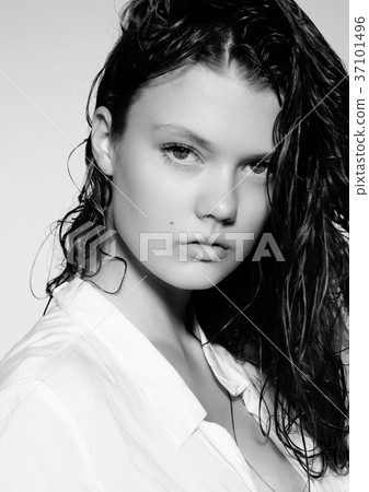 Portrait of beautiful young girl with long wet hair Portrait of beautiful young girl with long wet hair 37101496