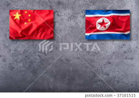 China and North korea flag on concrete background China and North korea flag on concrete background 37101515