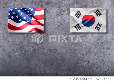 Usa and South korea flag on concrete background. 37101542