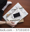 flat lay with mobile phone, pen, sketchbooks on 37101833