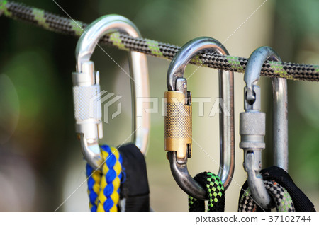 Climbing sports image of a carabiner on a rope 37102744