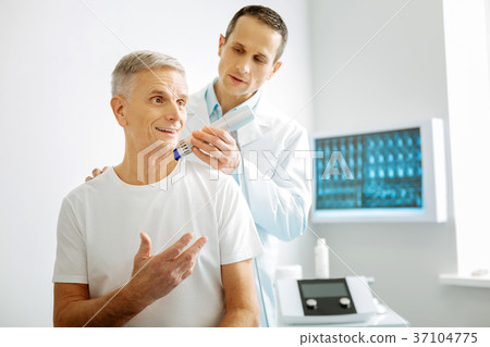 Smart handsome doctor using special scanning Smart handsome doctor using special scanning 37104775