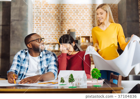 Three awesome optimistic colleagues   working 37104836
