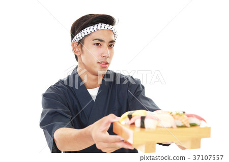 A smiling sushi craftsman A smiling sushi craftsman 37107557