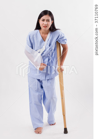 unlucky woman patient with broken arm and leg 37110769