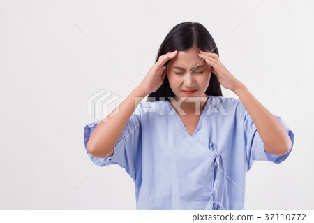 woman patient suffering from headache, pain 37110772