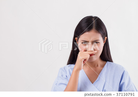 woman patient catching a cold, runny nose 37110791