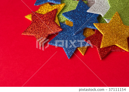 set of glittering stars on red background 37111154