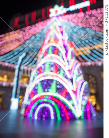 Defocused city light spot Defocused city light spot 37112379