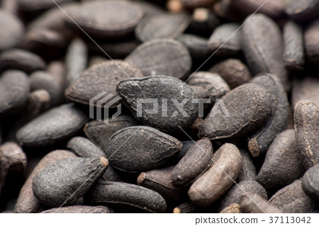 Close up Pile of black sesame seeds background 37113042