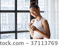 Woman near window 37113769