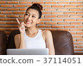 Smiling woman  37114051