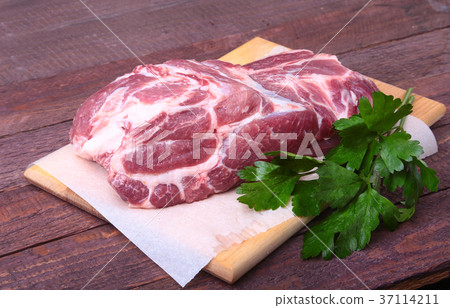 Raw pork neck chop meat with parsley herb Raw pork neck chop meat with parsley herb 37114211