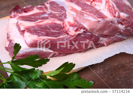 pork neck chop meat with parsley herb leaves 37114216