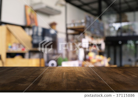 Empty dark wooden table in front of abstract  37115886