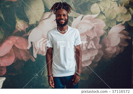 African American man with dreadlocks and a white T African American man with dreadlocks and a white T 37116572