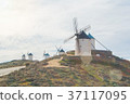 Rows of old white traditional windmills on the  37117095