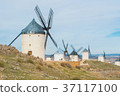Rows of old white traditional windmills on the  37117100