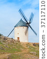 Old white traditional windmill on the hill near  37117110