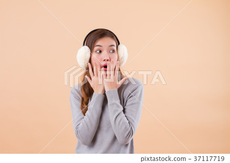 excited surprised asian woman looking up 37117719