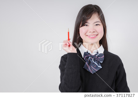 High school girl looking up with a pencil 37117827