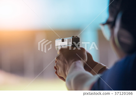 law enforcement aim pistol hand in shooting range 37120166