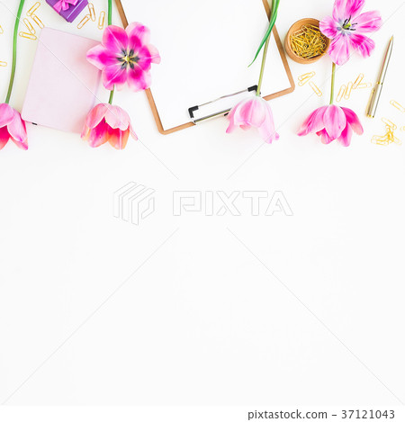 Home workspace with clipboard, diary, pink tulips Home workspace with clipboard, diary, pink tulips 37121043
