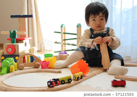 Baby playing with toys Baby playing with toys 37121503
