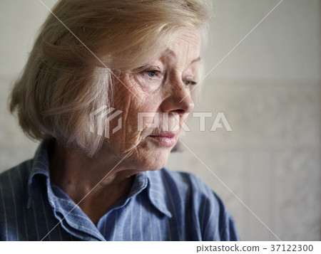 Sad elderly woman 37122300