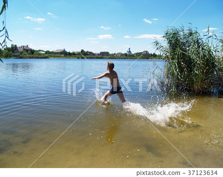 children bathe in the river children bathe in the river 37123634