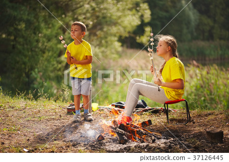 happy children hiking in the forest happy children hiking in the forest 37126445