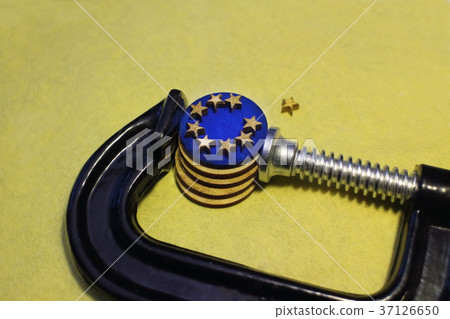 euro coin in the clamp  pressure 37126650