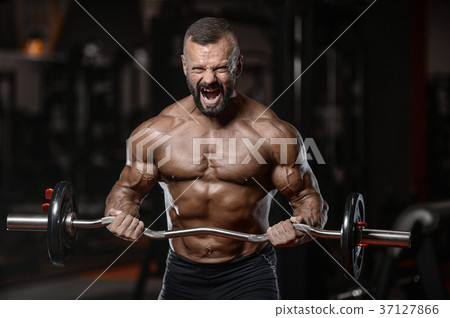 Old brutal strong bodybuilder athletic men pumping up muscles wi Old brutal strong bodybuilder athletic men pumping up muscles wi 37127866
