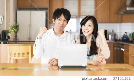 Young couple computer guts pose Young couple computer guts pose 37131191