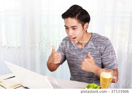 Men enjoying personal computers Men enjoying personal computers 37133906