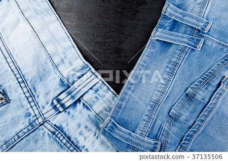 Jean background. Denim blue jean texture. Concept 37135506