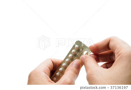 Woman hand taking birth control pills. Asian adult 37136197