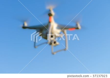 Abstract blur drone quad copter for background 37137023